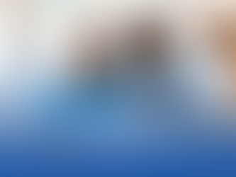 a woman explaining financial paperwork to another woman