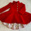Thumbnail: Girls Bright Red Duchess Style Coat, fully lined with mandarin style collar and four gold effect and faux pearl buttons