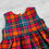 Thumbnail: Girls Teal & Pink Tartan Sleeveless Dress Front Bodice View laying on a grey background