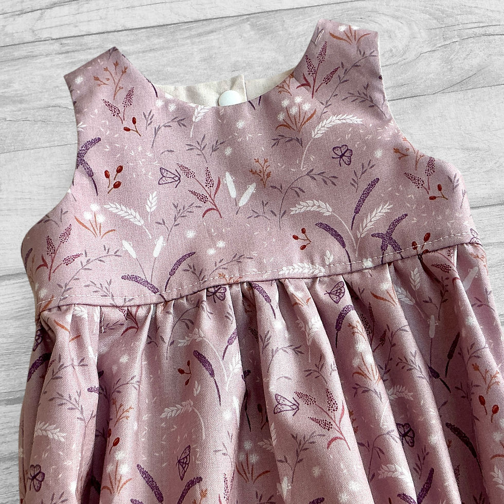 Thumbnail: Baby Bubble Romper Meadow print on light purple taupe cotton fabric, front bodice view sleeveless