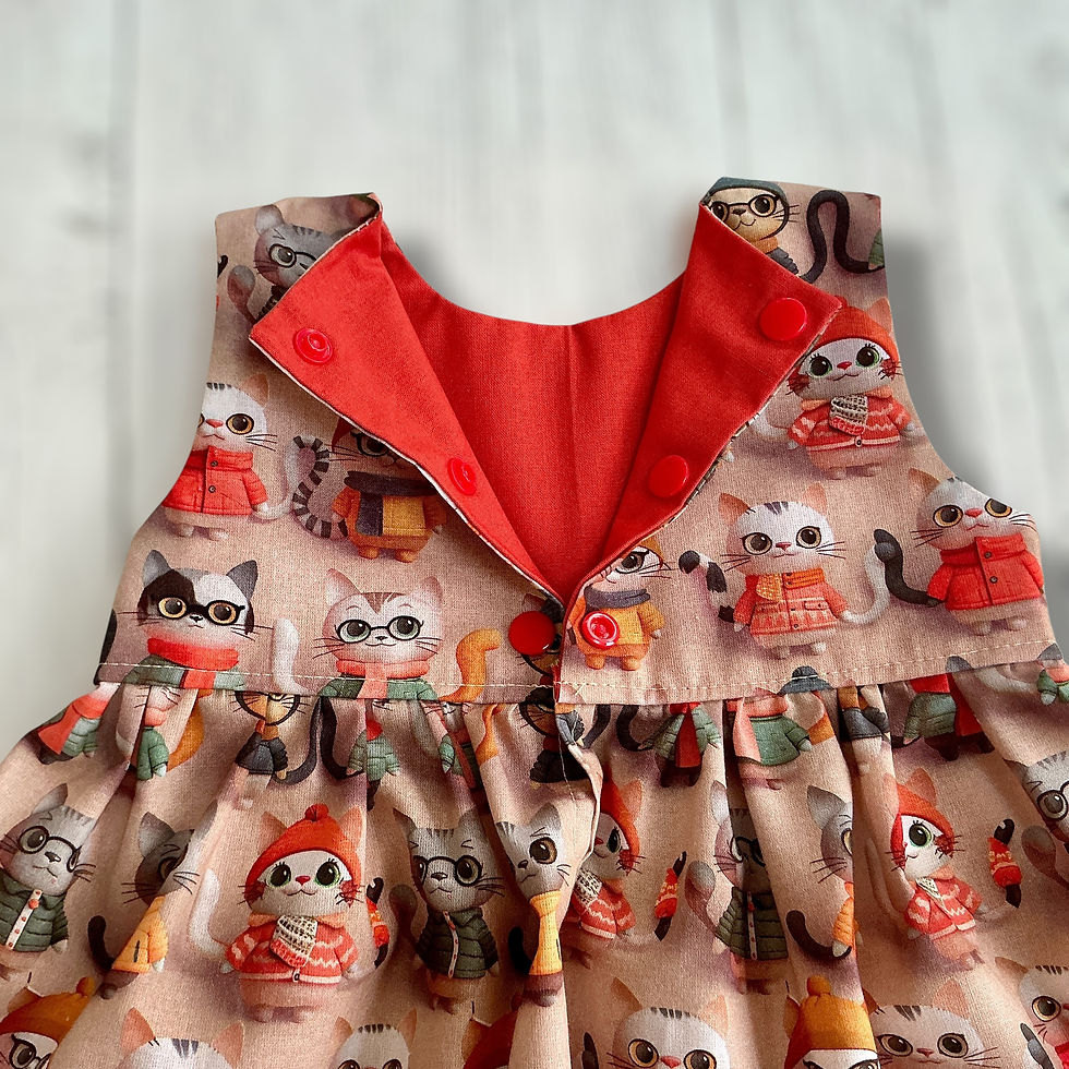 Thumbnail: Girls Sleeveless Dress showing orange lining in a Quirky Cat 3d effect digital cotton fabric on a light grey background