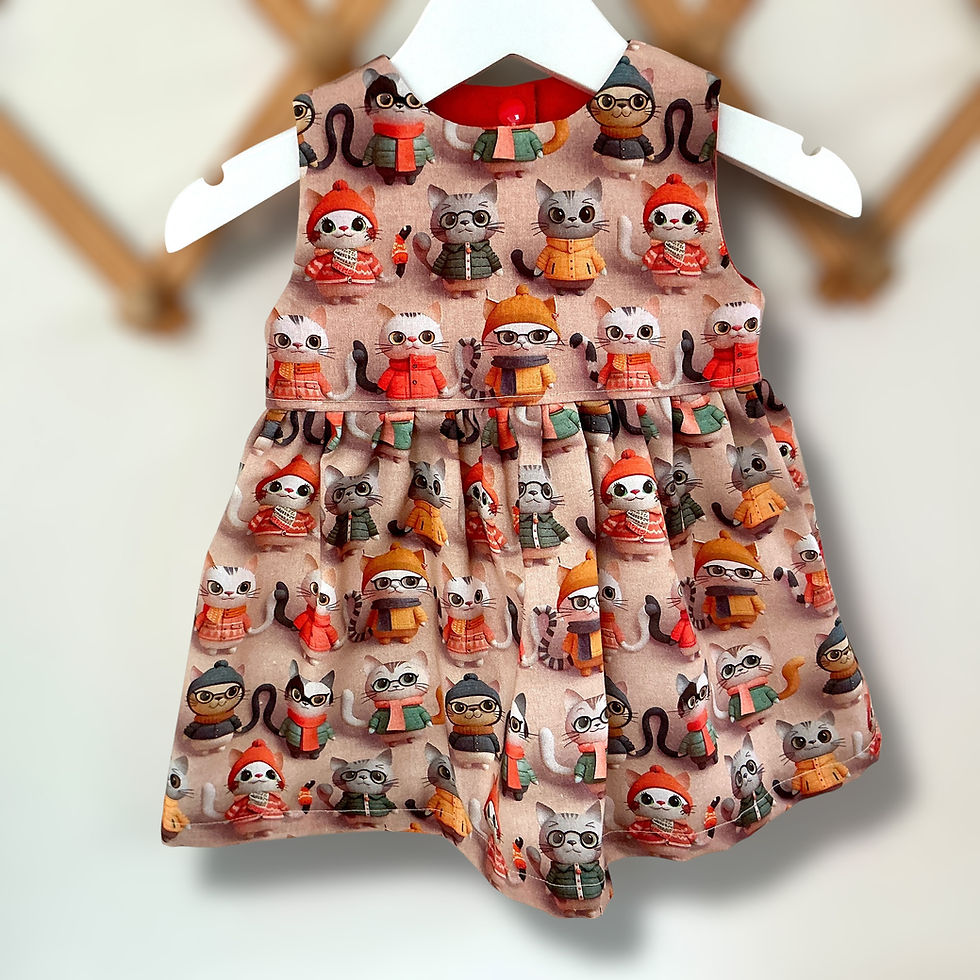 Girls Sleeveless Dress in a Quirky Cat 3d effect digital cotton fabric on a hanger
