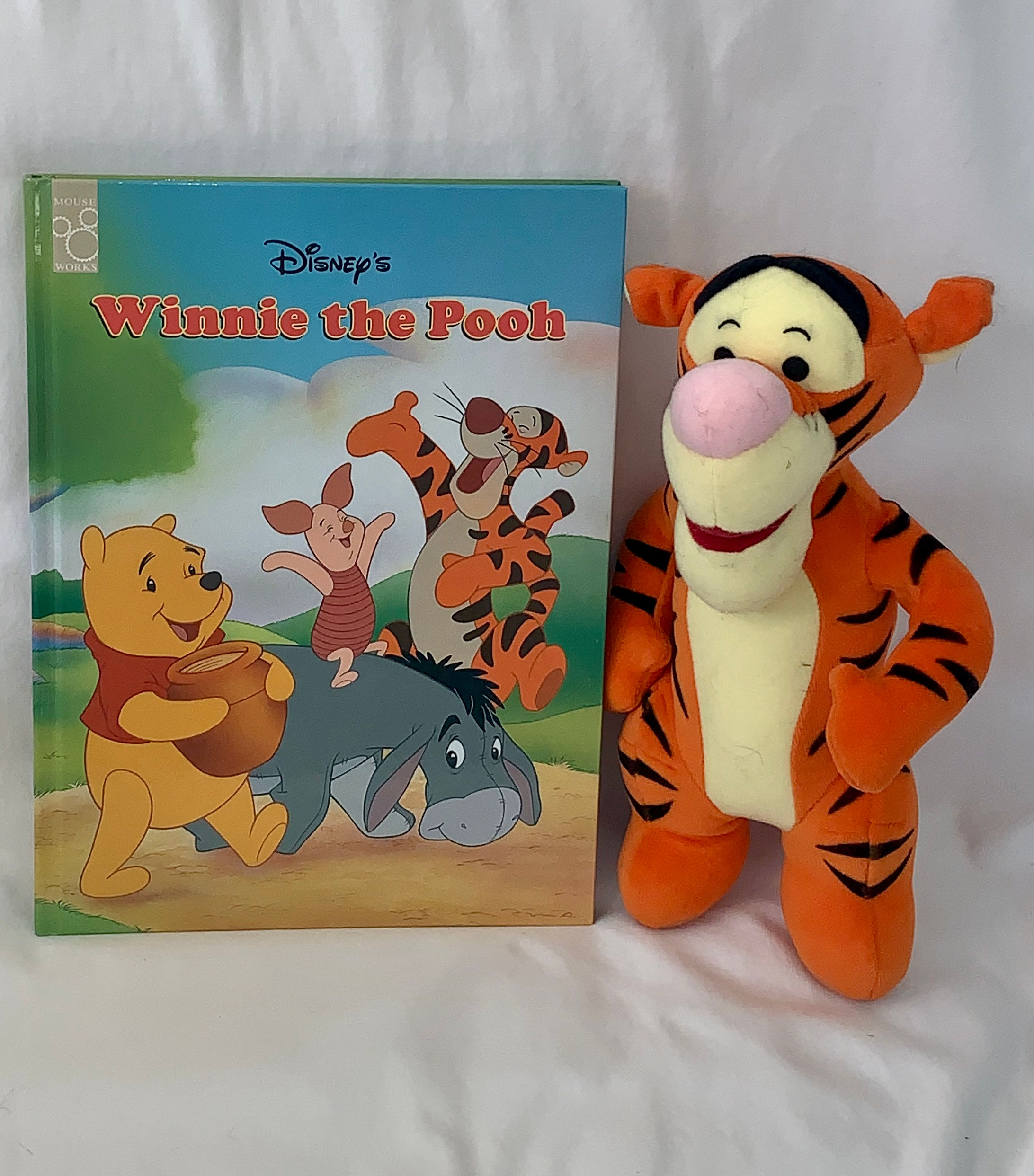 Disney's Winnie The Pooh (book) with small Tigger