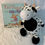 Thumbnail: Nell Nugget and the CowCaper (book) & cow plush