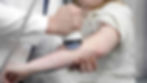 Focused shockwave therapy being applied to the outer elbow—stimulating natural healing in patients with chronic tennis elbow.
