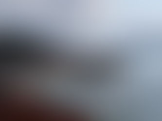 O Miradoiro de a Granxa, Galiza, Espanha, vê-se mar com barcos ao fundo e céu nublado. Sensação de tranquilidade. 