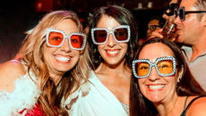 Groove around the Christmas Tree at Howl At The Moon's Boogie Wonderland Party on I-Drive