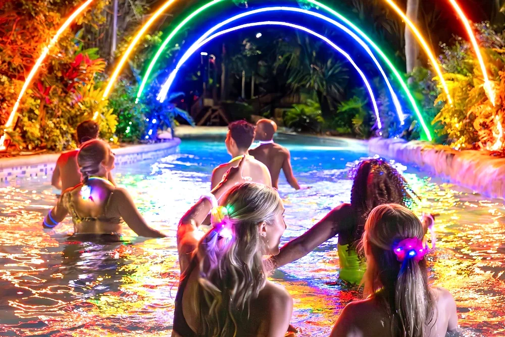 AquaGlow at Aquatica in Orlando returns with a new nighttime slide experience and exciting entertainment