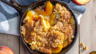 Enjoy a FREE Peach Cobbler for National Peach Cobbler Day this Saturday at Cowboy Chicken