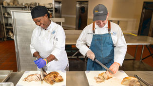 Disney World celebrates Thanksgiving by serving hundreds of meals to the Coalition for the Homeless