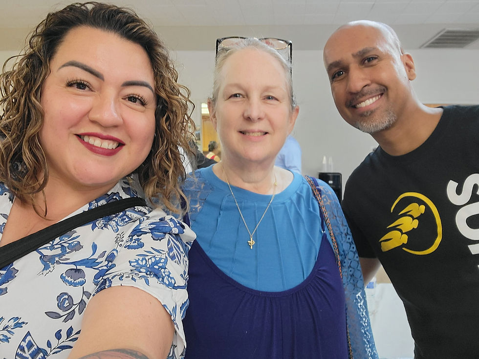 From left to right: Brandee, Elizabeth, and Pastor Alvin.