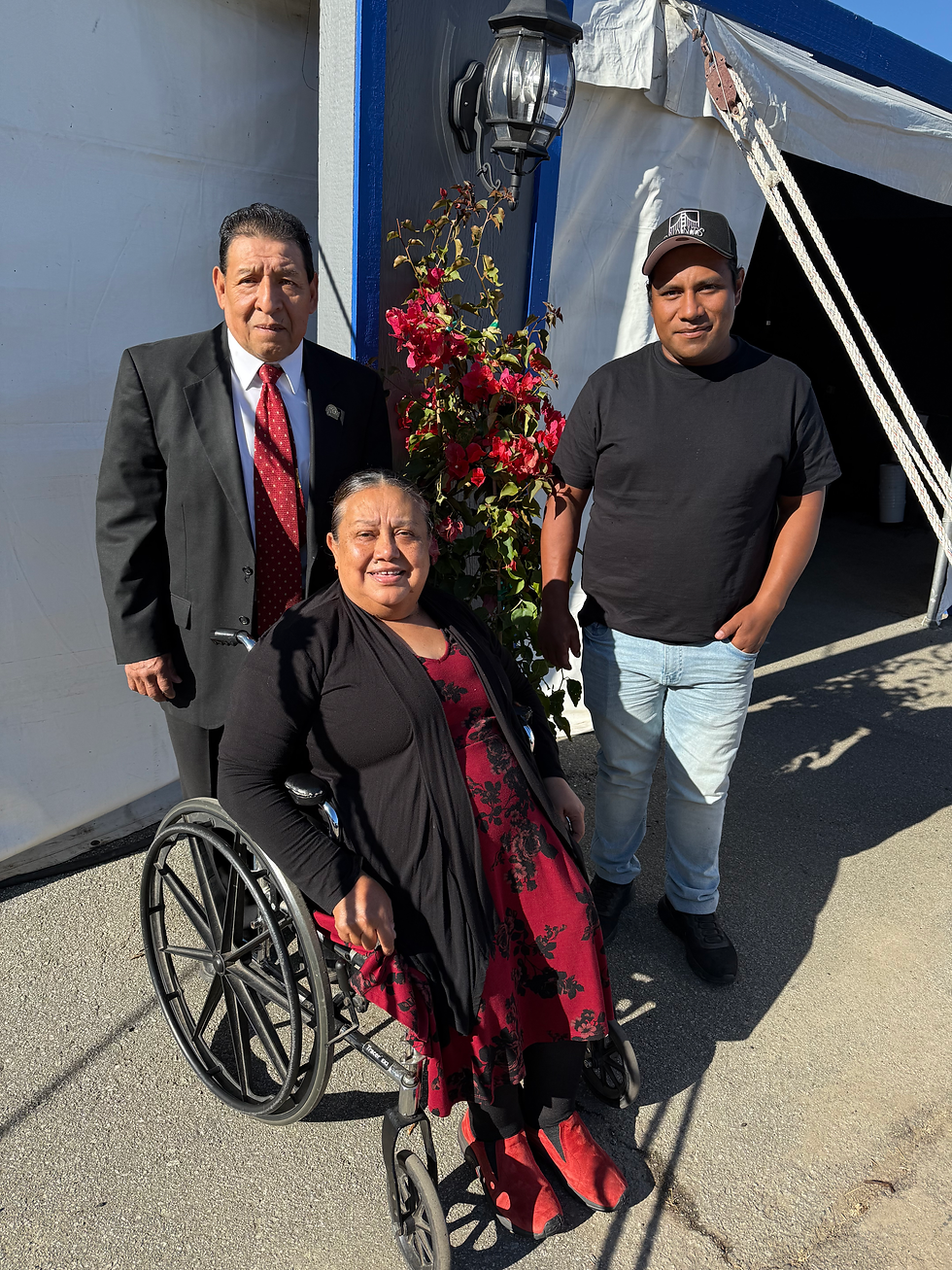 Alma and Pepe Hernández alongside Miguel