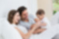 cheerful-couple-playing-with-baby-girl.jpg