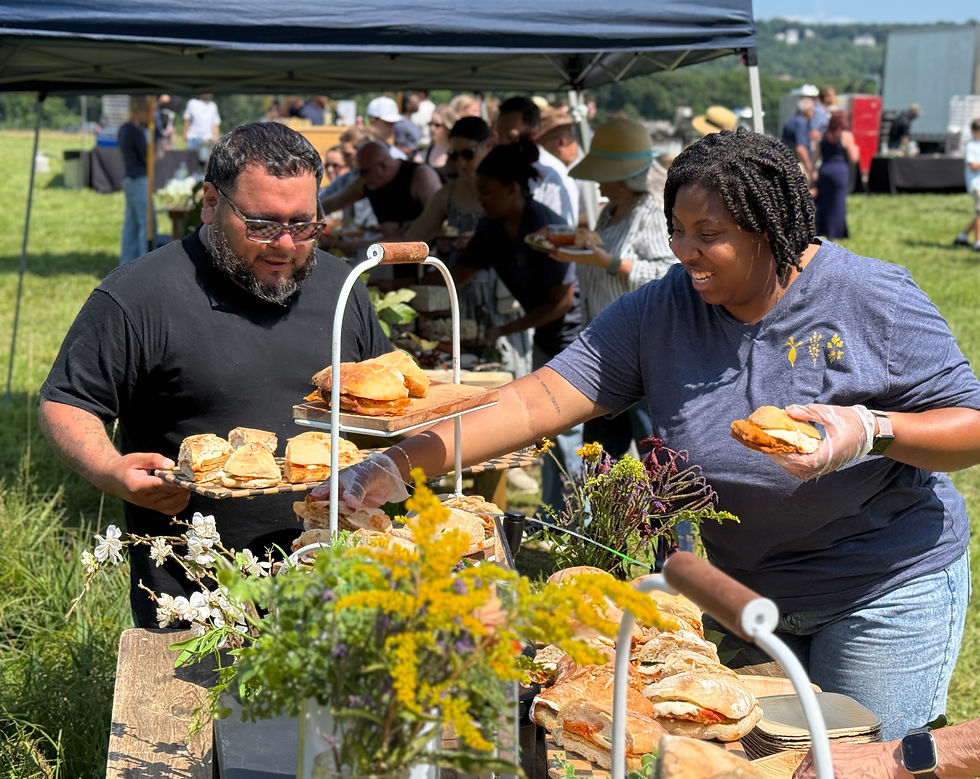Victor Torres and Sharise Abraham re-stock the grilled sandwich station.