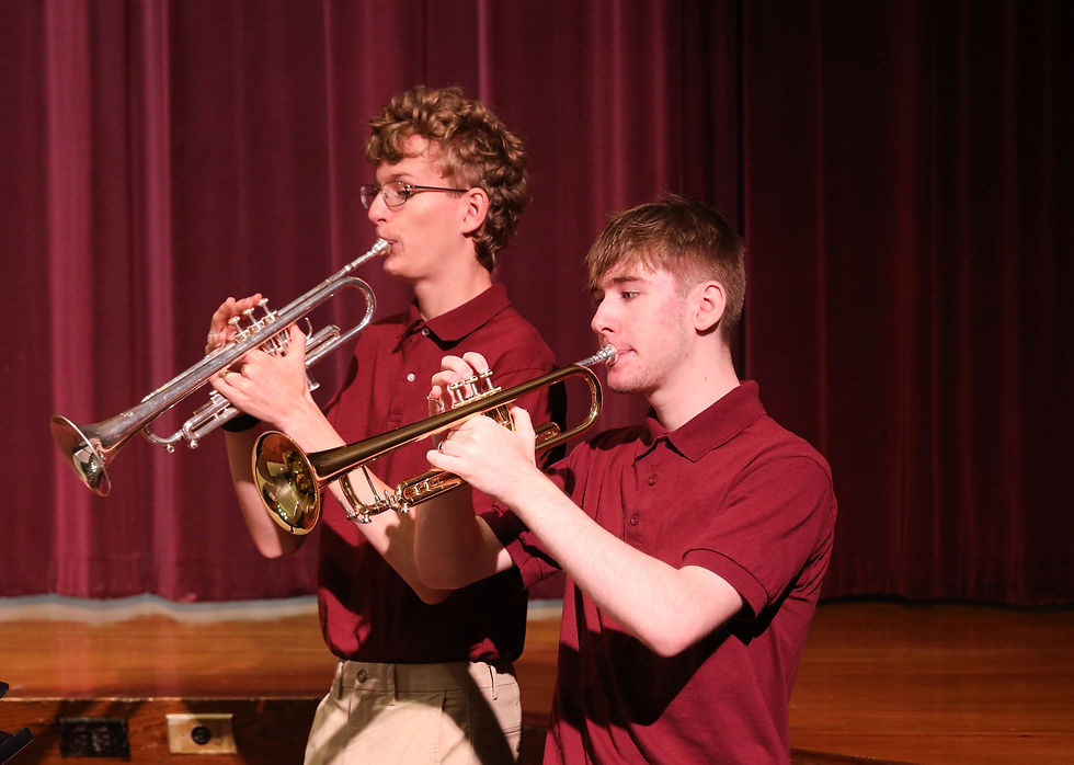 Adam Drefs and Adam Kozikowski perform the Star-Spangled Banner.