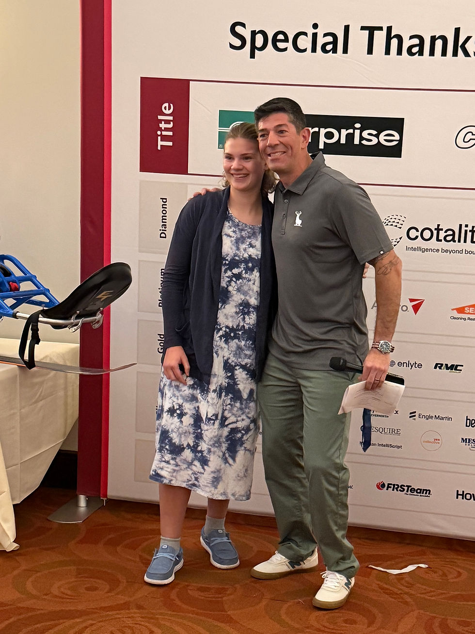 Pictured here on Oct. 2025 at The Hartford Insurance Co.’s fundraising gala for the Move United Human Achievement Award Ceremony: Brynna Oliver with Paralympic medalist snowboarder Keith Gabel, who presented Brynna and another other boy with the award.