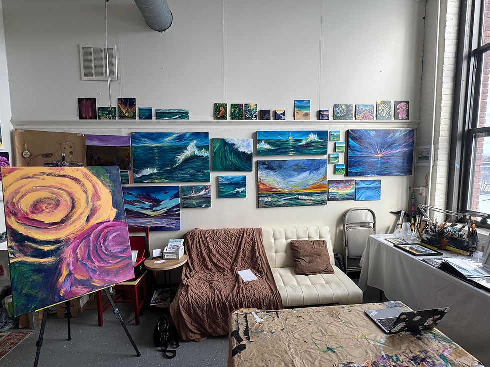 Bonnie Arapicio’s light-filled studio is filled with her work. Lately, she has been painting oceans. Photo by Tracey Weiss