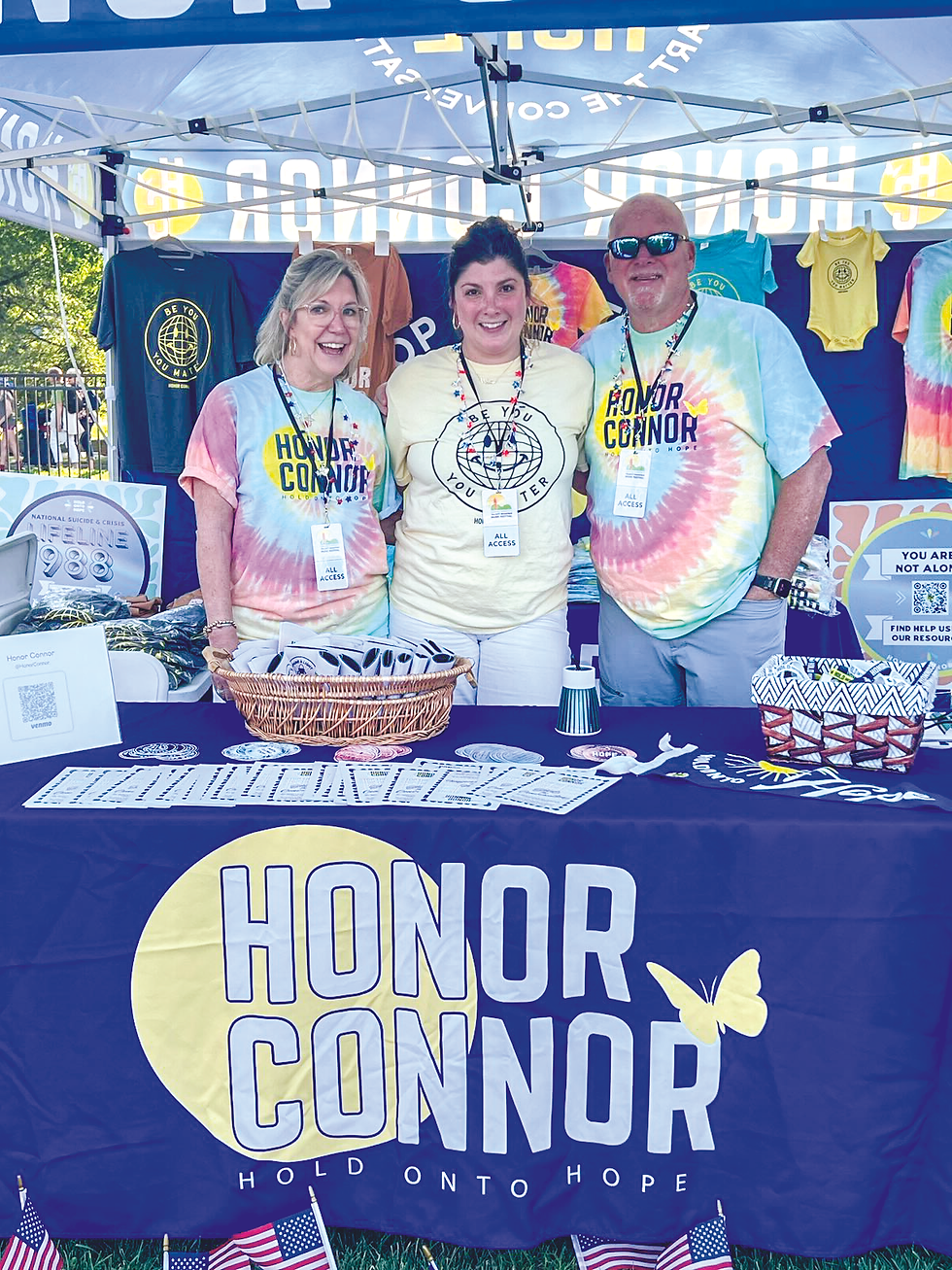 Connor’s parents Lisa and Scott, and his sister Emily West (center), at a previous Walk & Talk event.