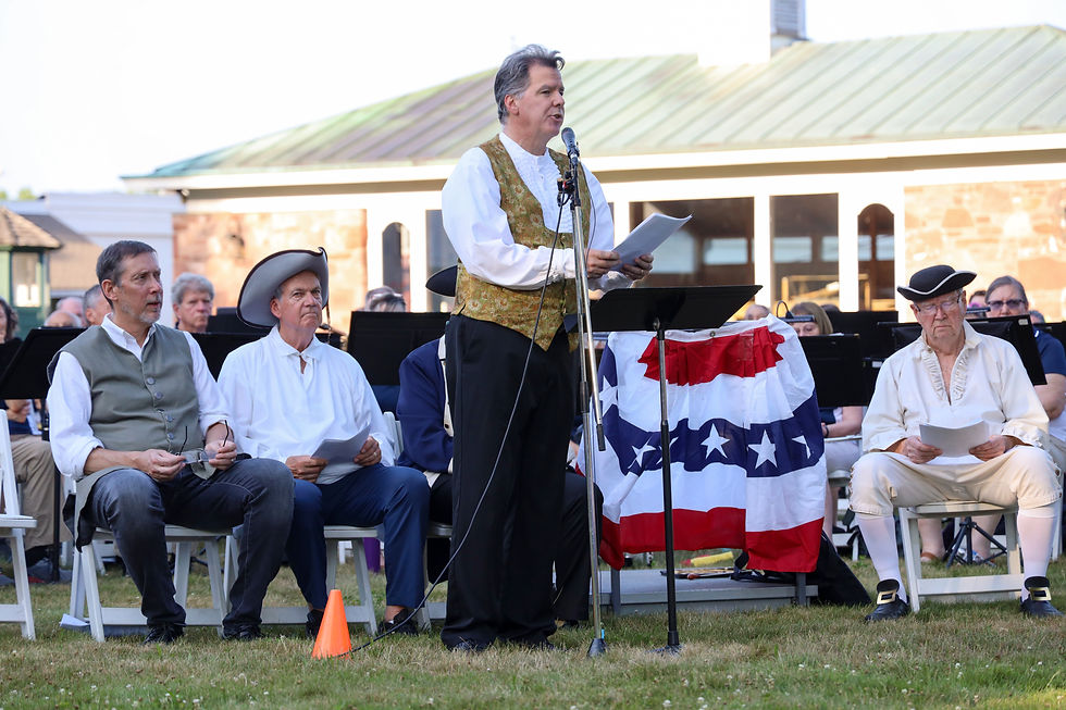 Stephen Maher, playing William Williams, reads from the Declaration of Independence. 