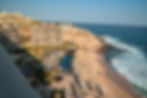 Ocean and Resort Pool View from the Rooftop Bar at The Cape Cabo during golden hour
