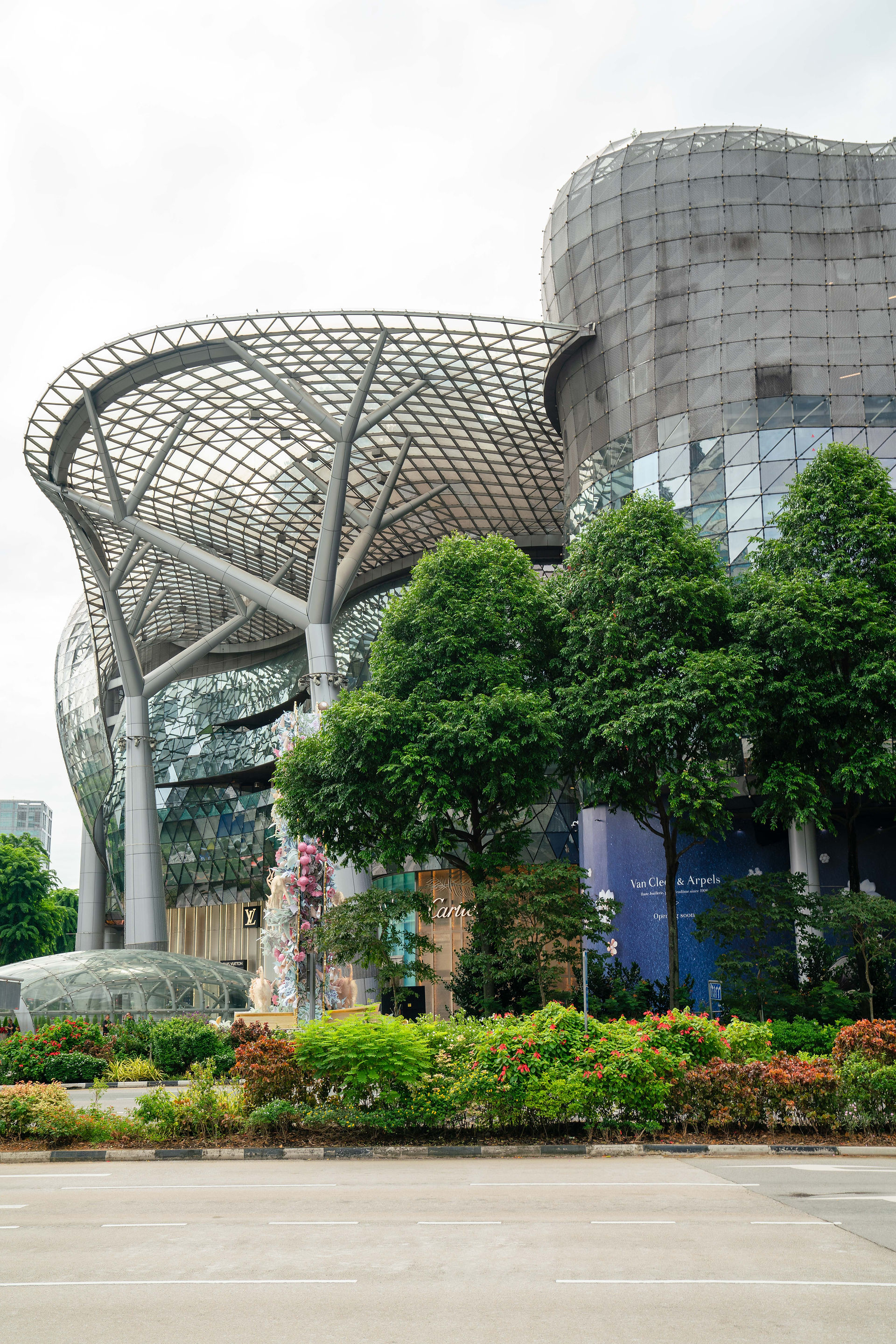 radiuses architecture surrounded by the trees on orchard road  