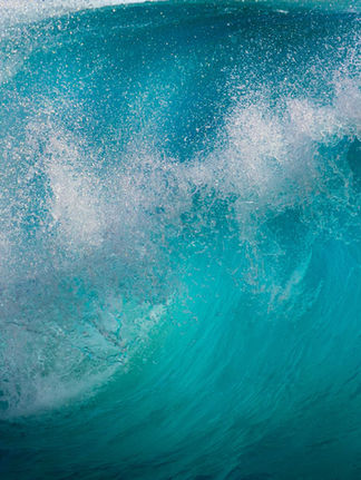 vibrant blue water details from a crashing wave