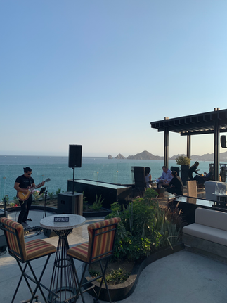 live music at the outdoor roof top bar at The Cape with ocean views of El Arco