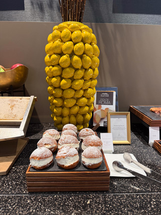 Famous Maritozzo Roman Pastries and lemons at the breakfast buffet at Anantara Palazzo Naiadi Rome Hotel  