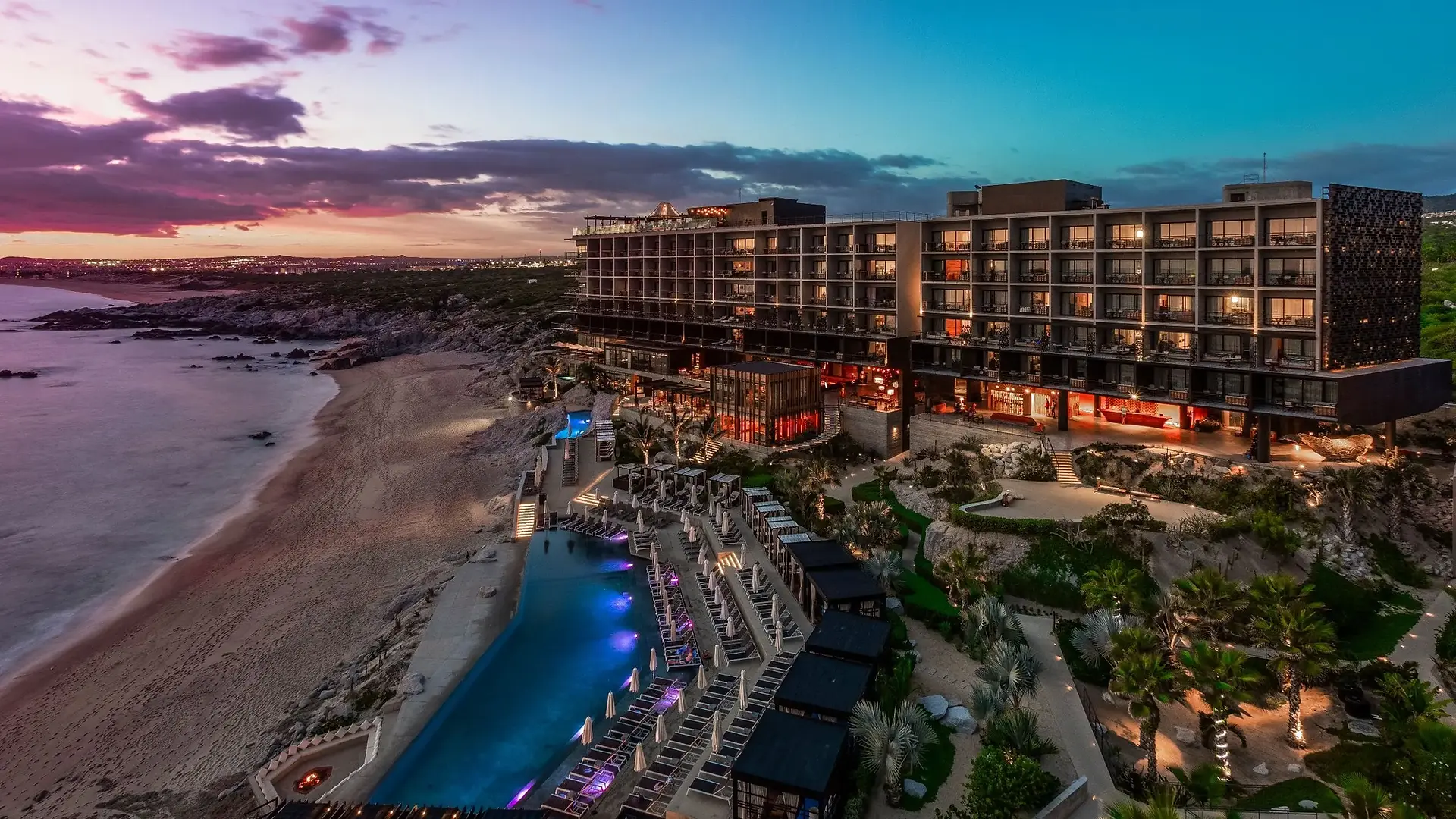sunset skies and lighting illuminated form The Cape Hotel 