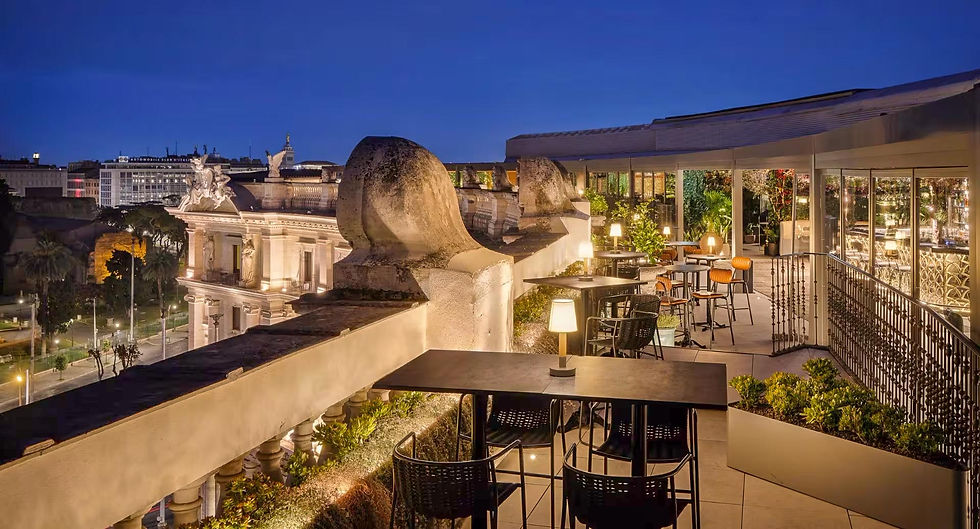 Seen by Oliveier Rooftop Dining overlooking the plaza below at Anantara Palazzo Naiadi Rome Hotel 