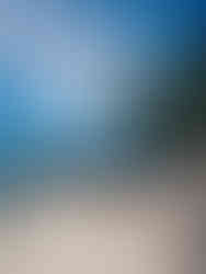 a white sand beach on the big island of Hawaii with lava rock and palm trees