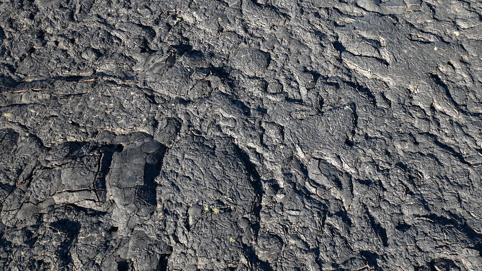 view looking down at the lava flow pathways that hardened after an active volcano on the big island