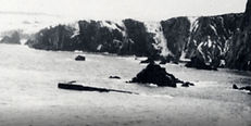 2-Truxton-Wreckage-barely-visible-above-the-tide.jpg