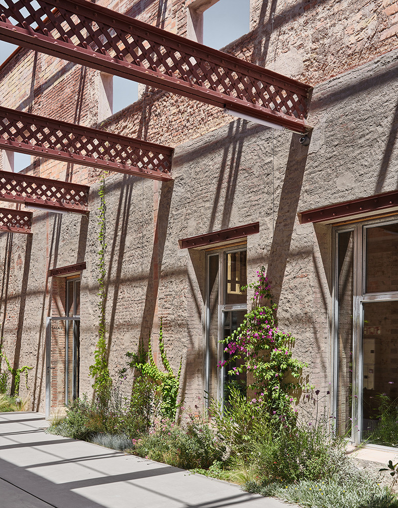 Eye-level view of a vibrant community space with artistic installations