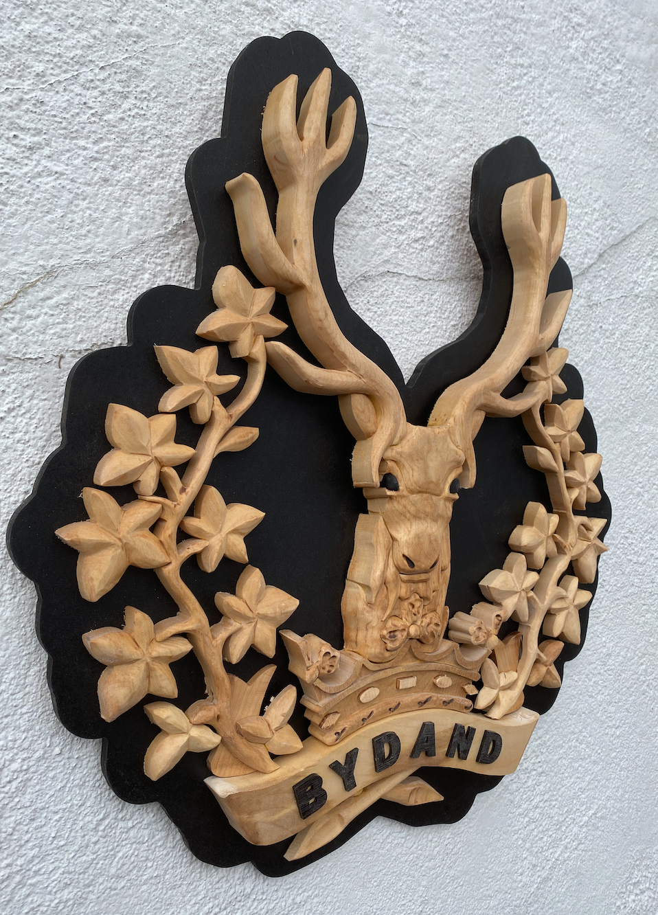 Thumbnail: Gordon Highlanders hand carved wooden military crest in natural hardwood finish angle