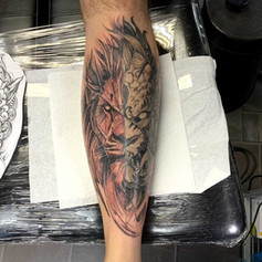 Tattoo of lion, split into two
