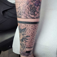 tattoo with pattern design on arm