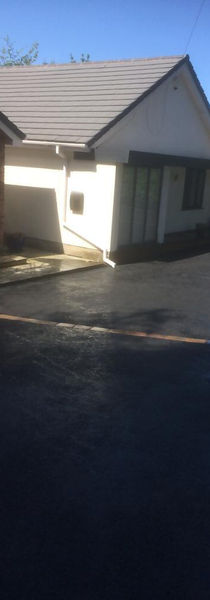 Tarmacadam Driveway in front of a bungalow