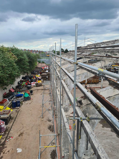 Construction site scaffolding on grey day