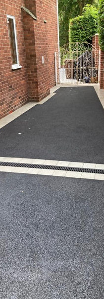 Tarmacadam Driveway with grey bricks embedded