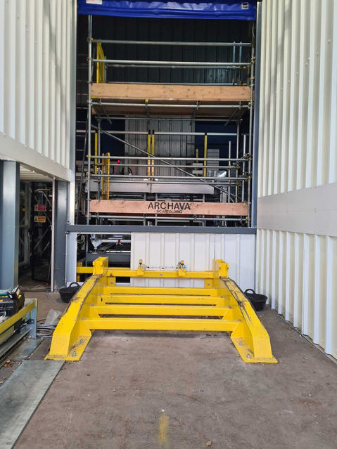 Scaffolding in contained unit