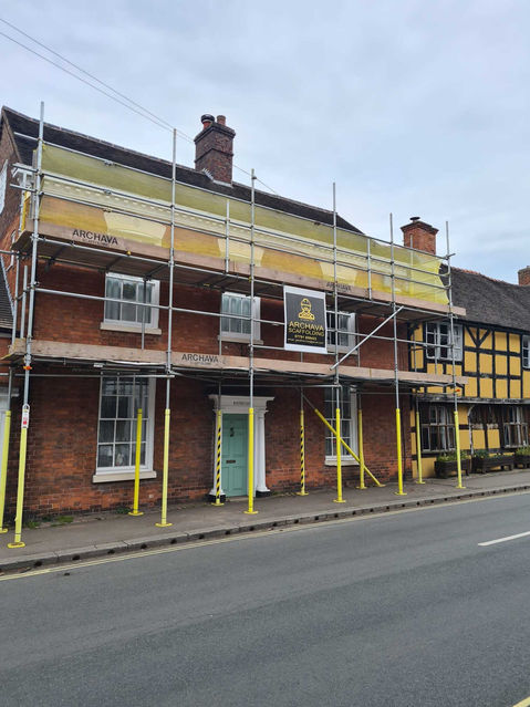 House on main road with scaffolding
