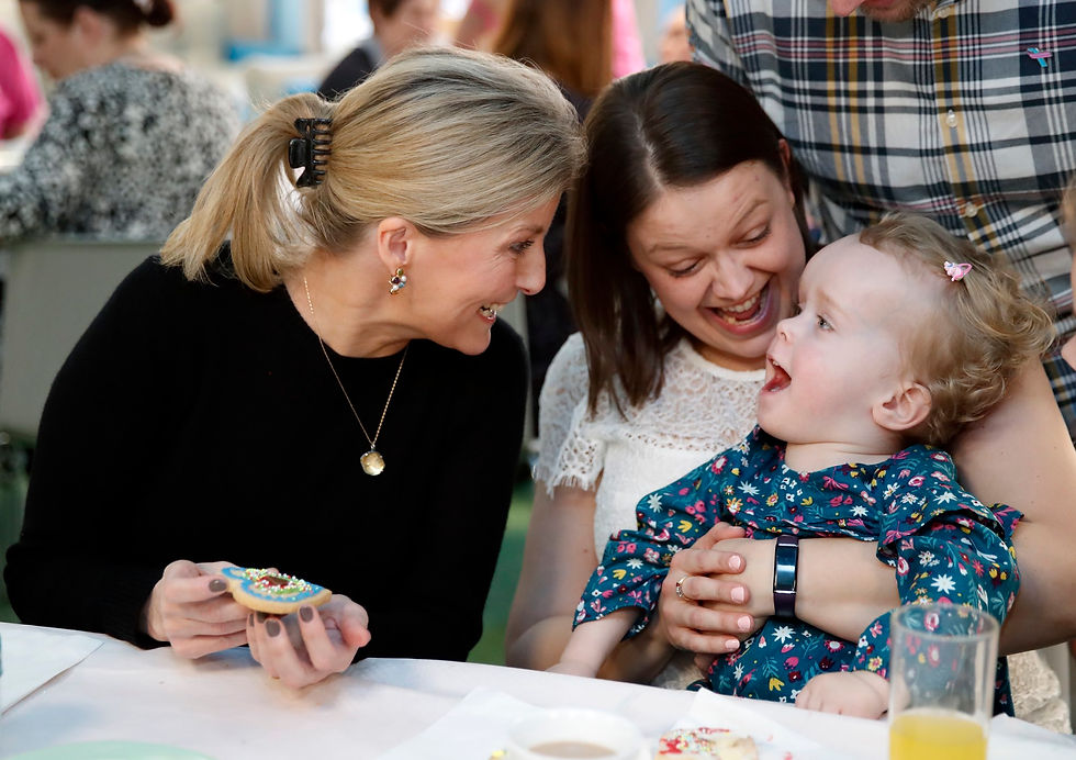 Sophie Wessex at Shooting Stars Hospice making biscuits.