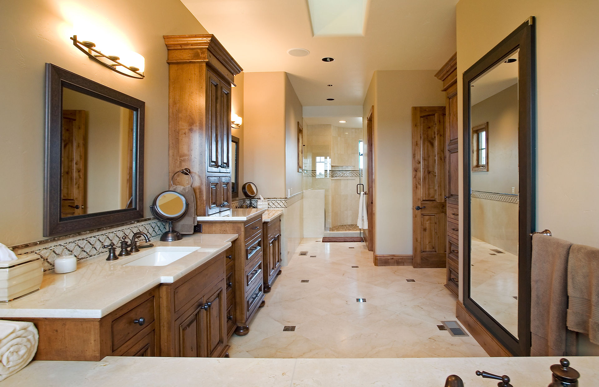 owner's suite bathroom in a custom home in Tetherow built by PGC Building + Design