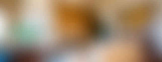 Living Room With Full Wood Fireplace & Vaulted Ceilings - Luxury Custom Home Awbrey Butte