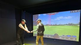 Golf lesson on golf simulator at  Bermuda Club in Carlsbad