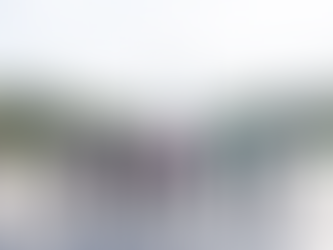 Group of dancers walking in front of the Washington Monument