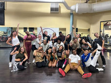Group of AVA dancers posing in a studio.