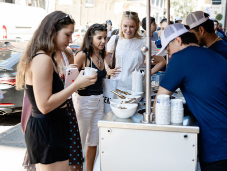 Staffed gelato cart serving guests at a street activation in SoHo, New York City