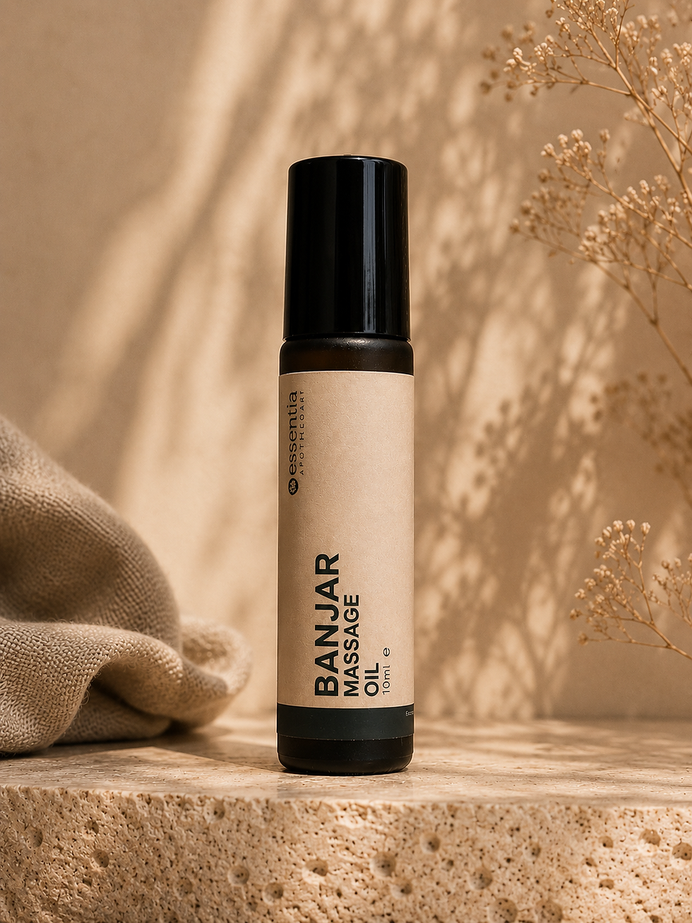 amber glass roller bottle in warm editorial setting essentia apothecary